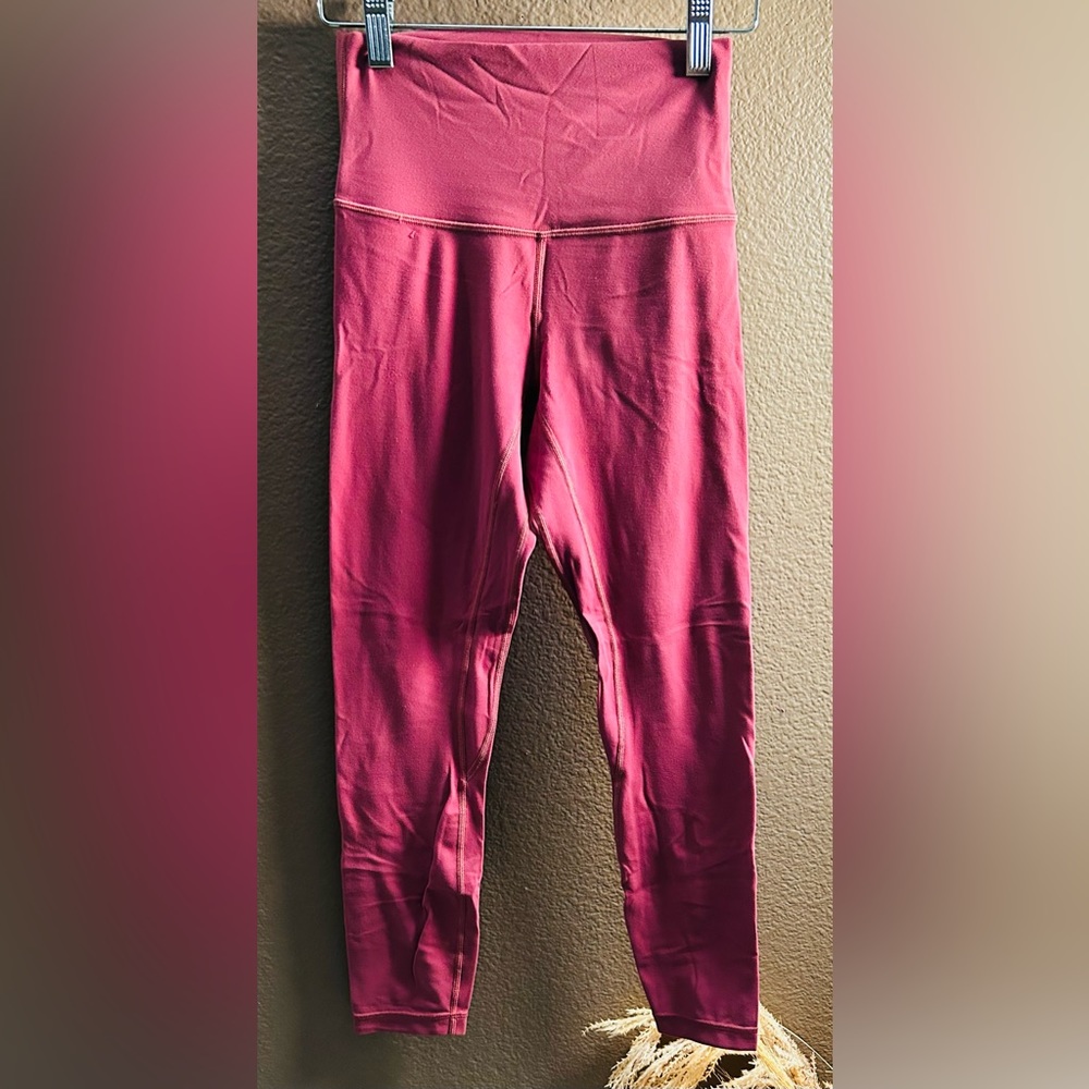 Lululemon leggings maroon color in great condition Aligns!!